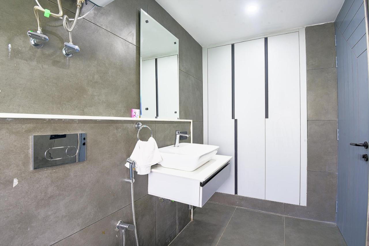 Bedchambers Serviced Apartments - Cyber City คูร์เคาน์ ภายนอก รูปภาพ