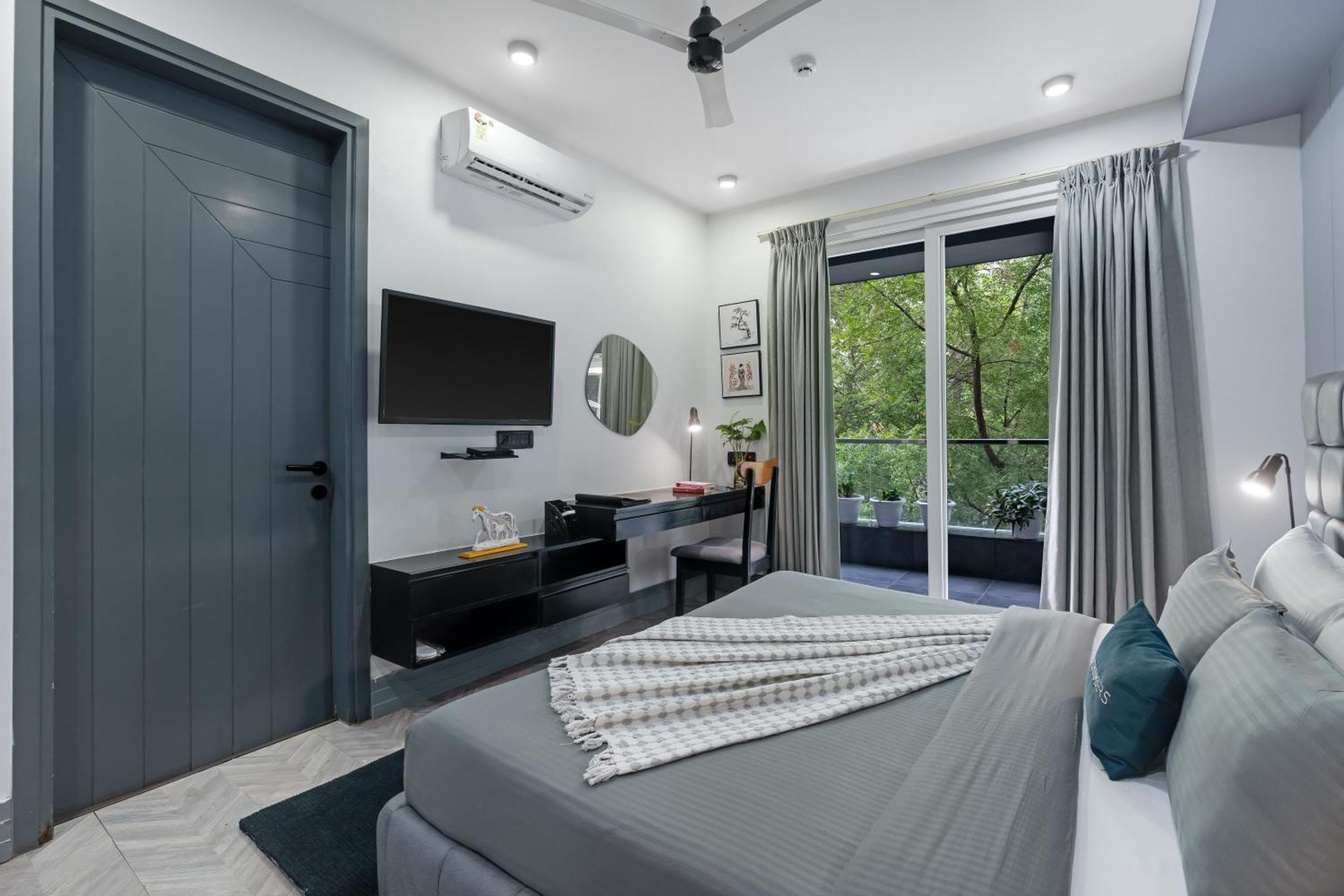 Bedchambers Serviced Apartments - Cyber City คูร์เคาน์ ภายนอก รูปภาพ