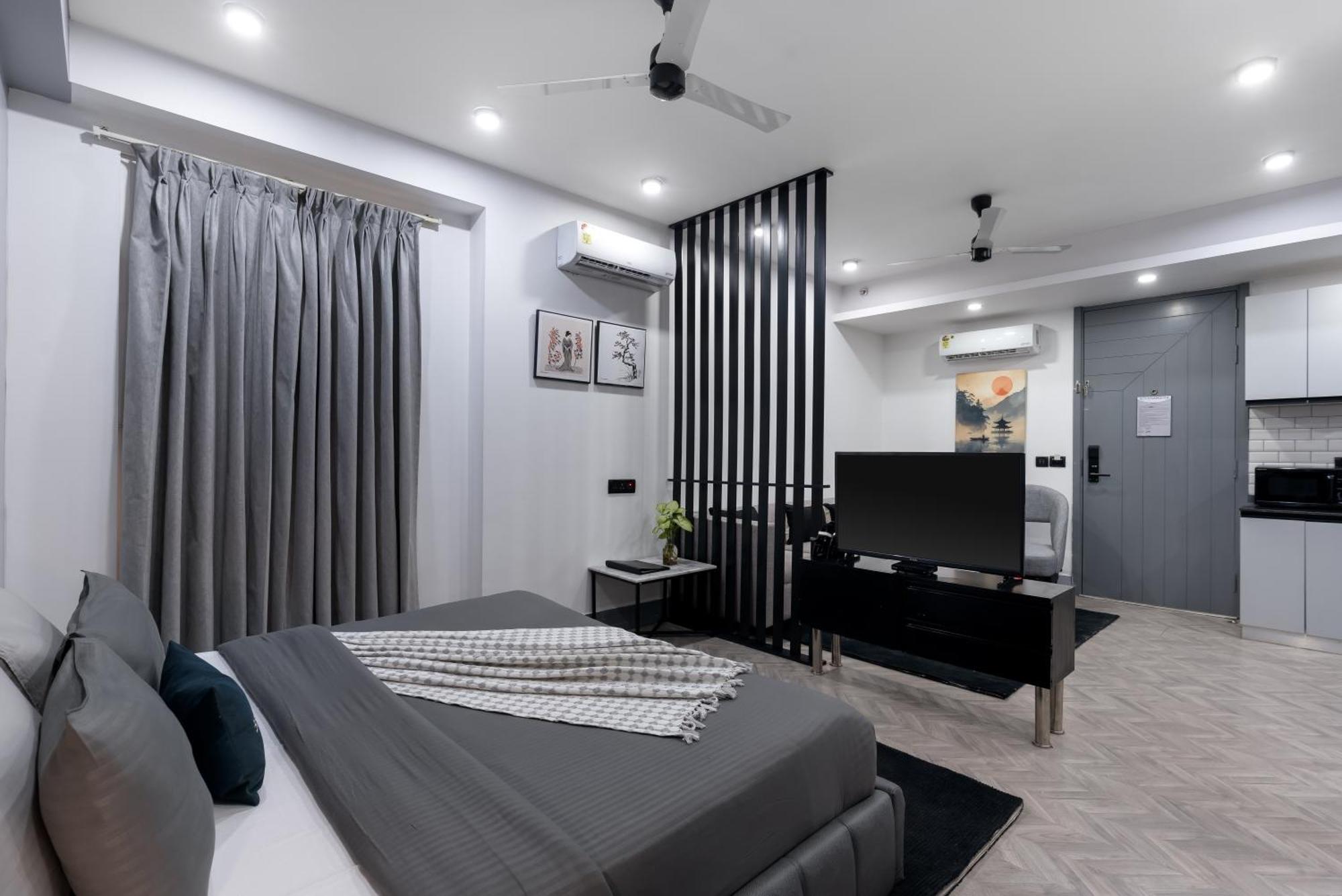 Bedchambers Serviced Apartments - Cyber City คูร์เคาน์ ภายนอก รูปภาพ